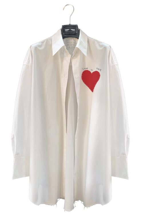 LOVE IS HERE SHIRT